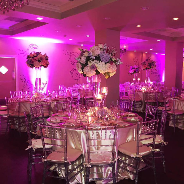 tall floral centerpiece on table